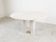 Round Italian travertine dining table 1970s