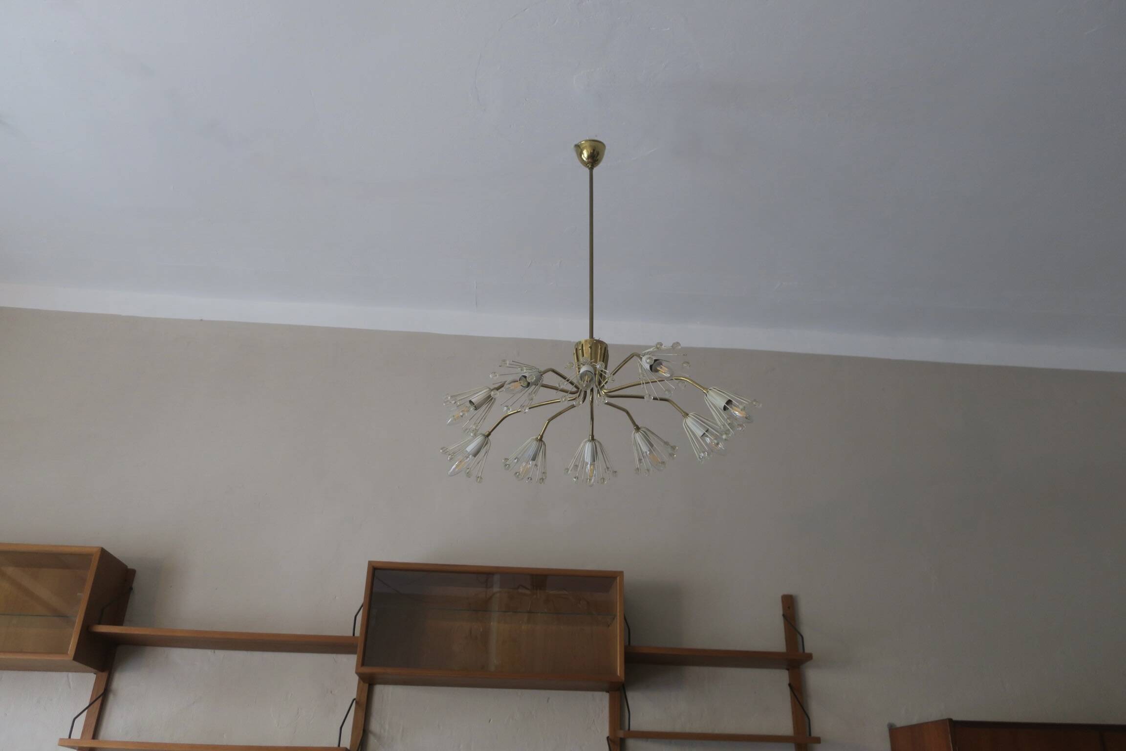 Elliptical brass and glass 10-arm chandelier, 1950s