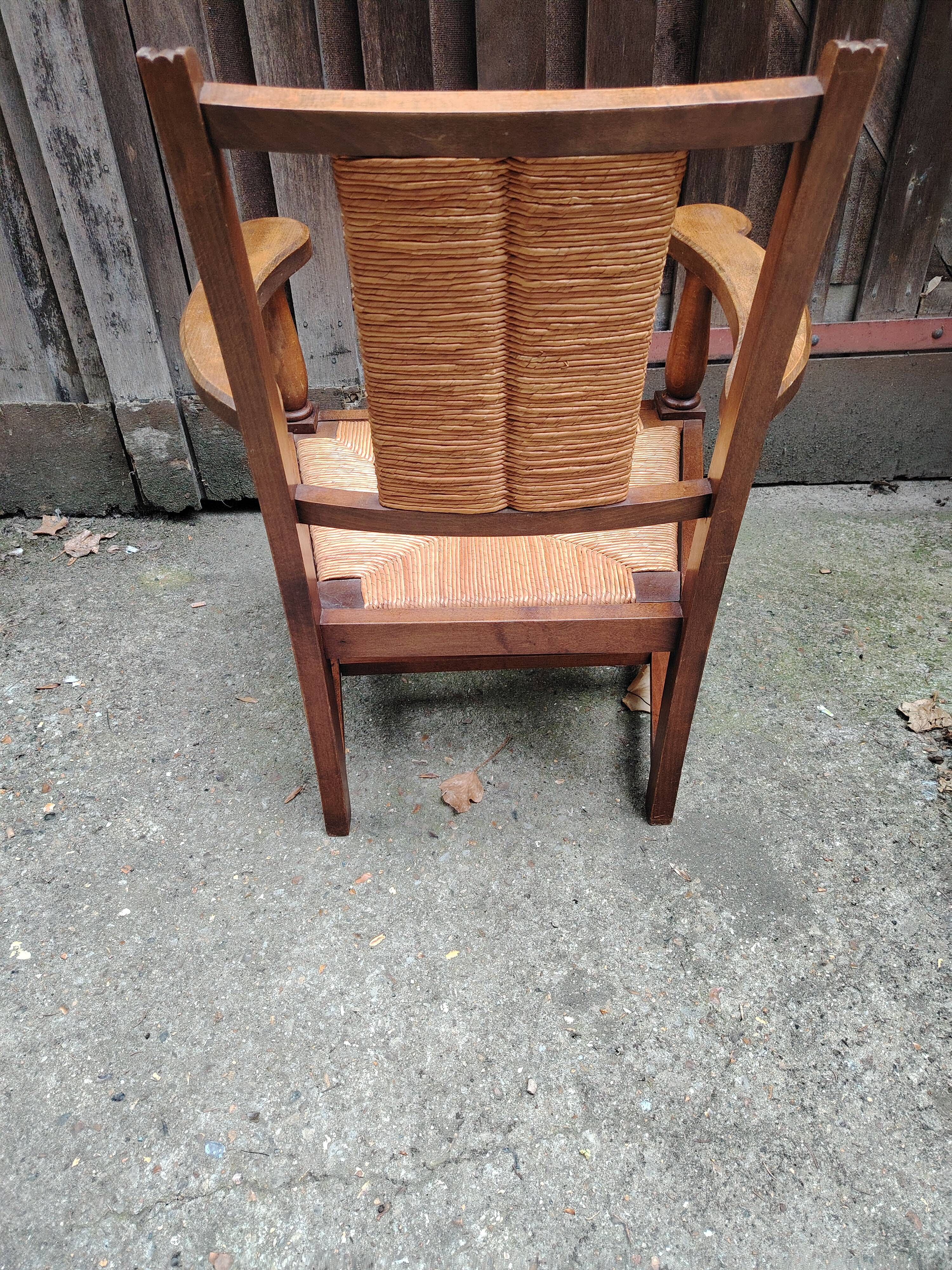 Solid wood and straw armchair