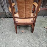 Solid wood and straw armchair