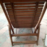 Teak stretchy long chair.