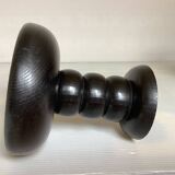 Pair of black stained wooden candlesticks