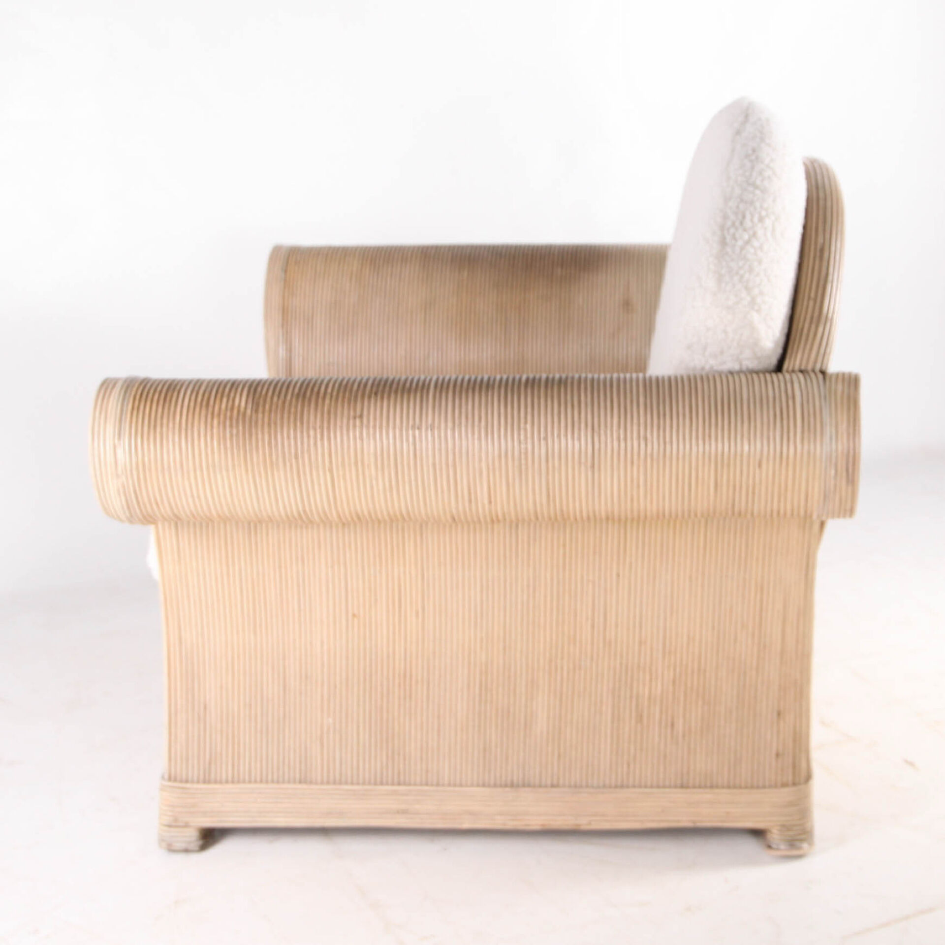 Rattan armchair by Betty Cobonpue