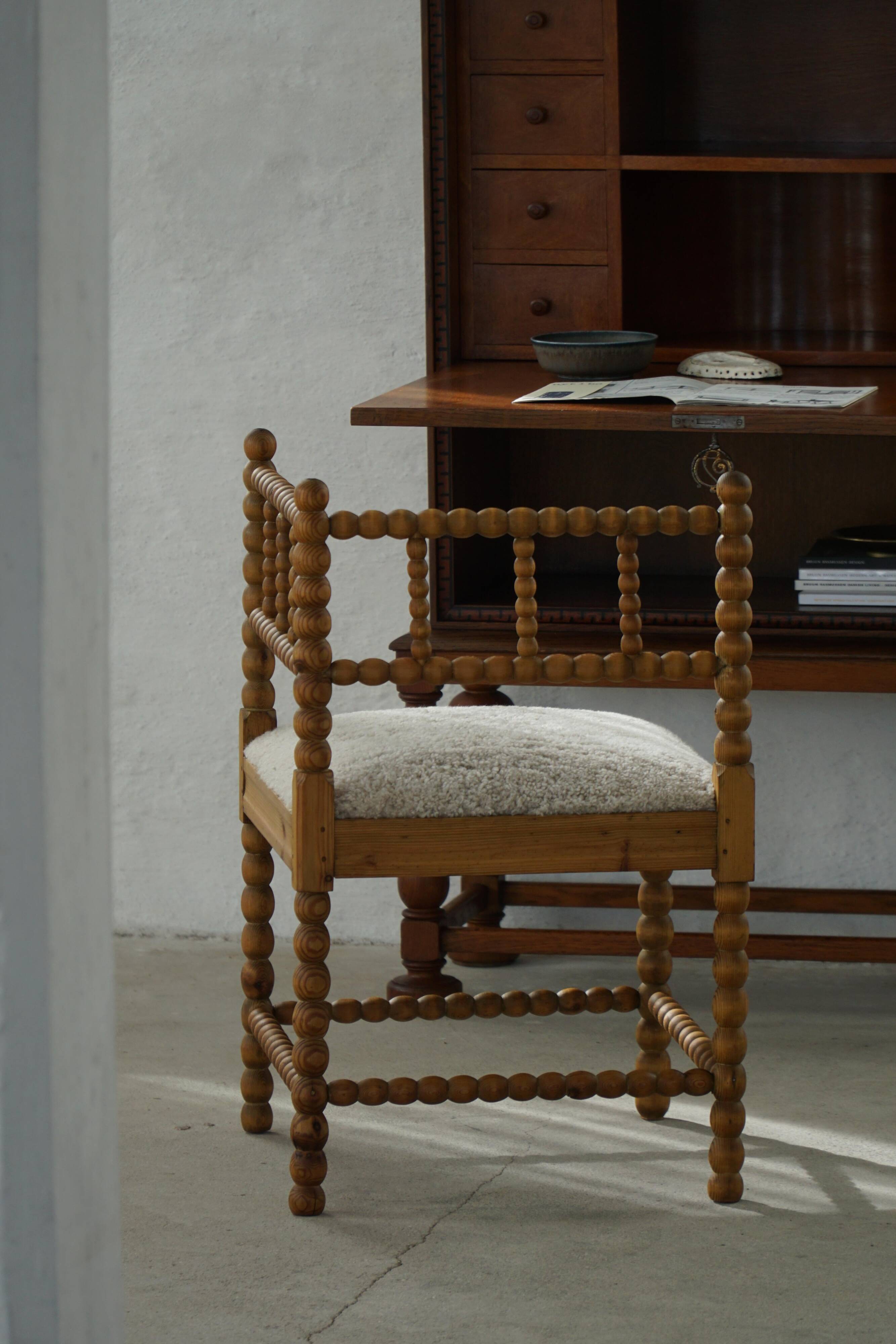 Antique French corner chair handcrafted with lamb's wool, early 20th century.