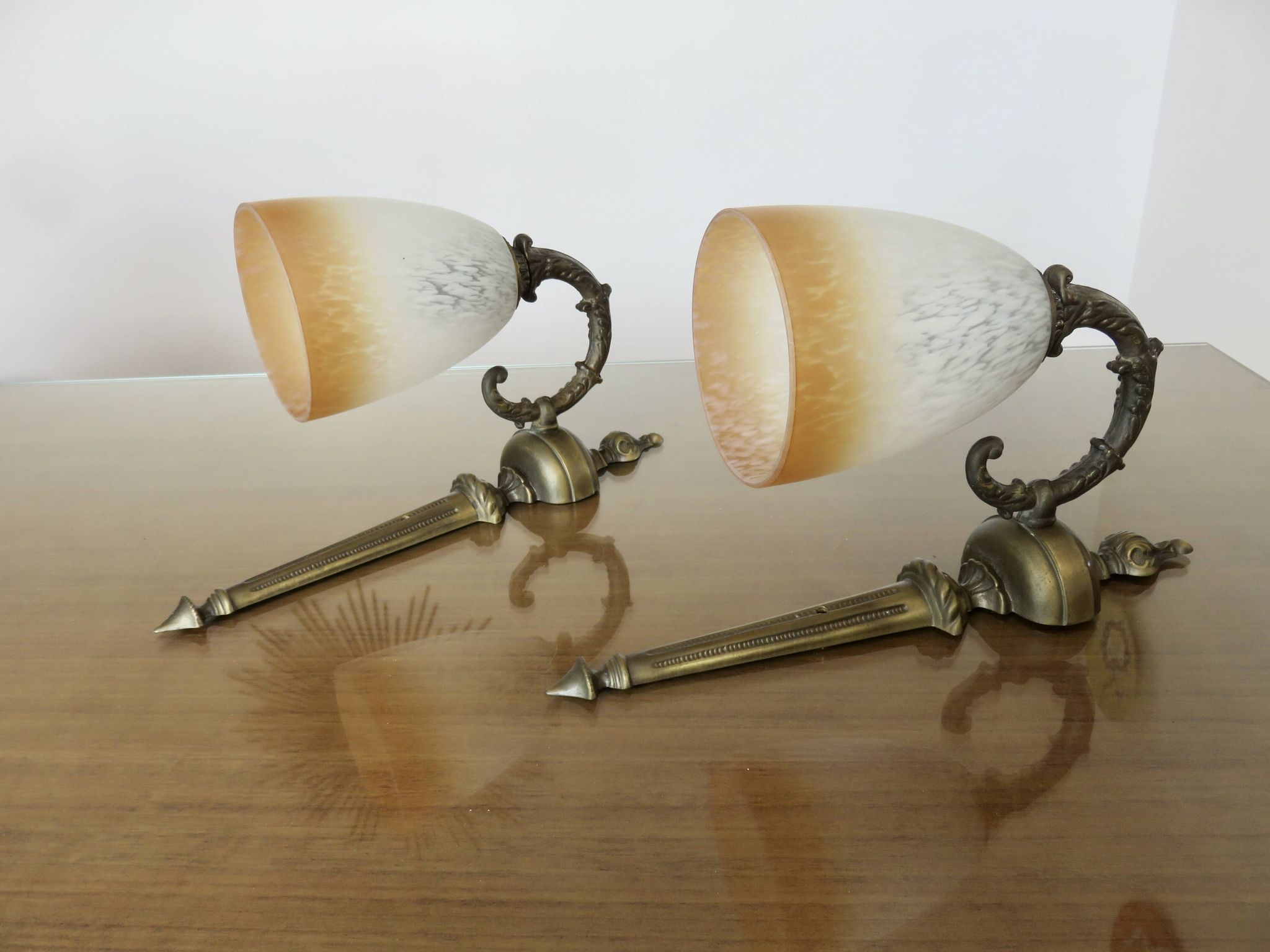 Pair of art deco wall lights in marbled glass and brass