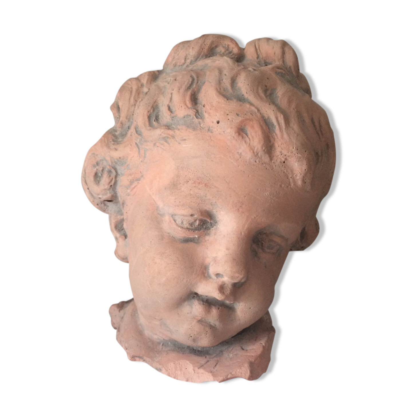 Child bust in plaster