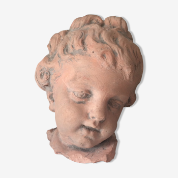 Child bust in plaster