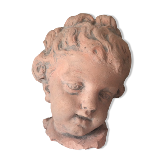 Child bust in plaster