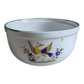 Vintage white faience salad bowl with exotic bird in Moustiers style.