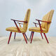 A pair vintage cocktail chairs with stripes and metal screws