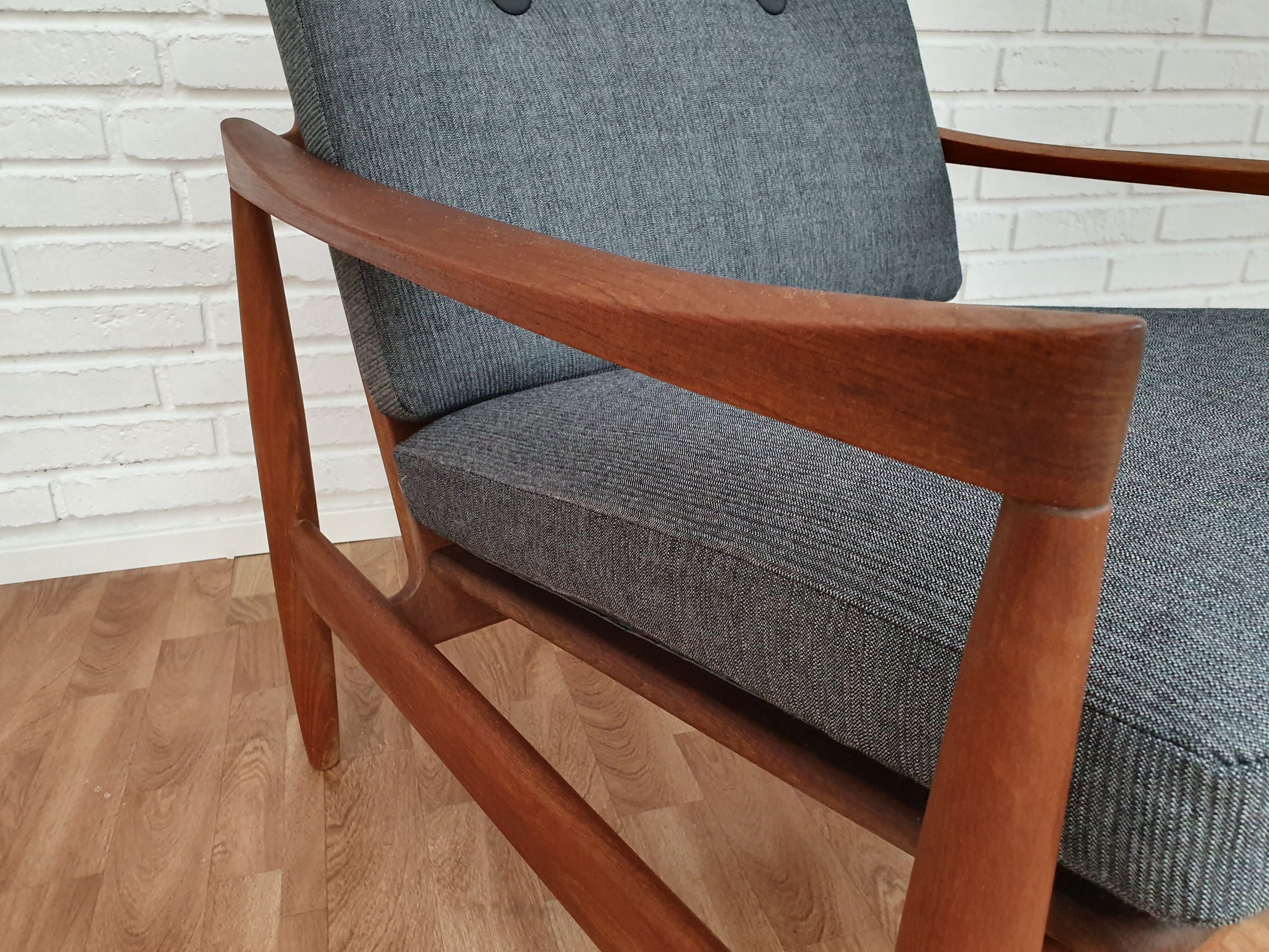 A pair of Danish armchairs, teak, wool, leather
