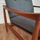 A pair of Danish armchairs, teak, wool, leather