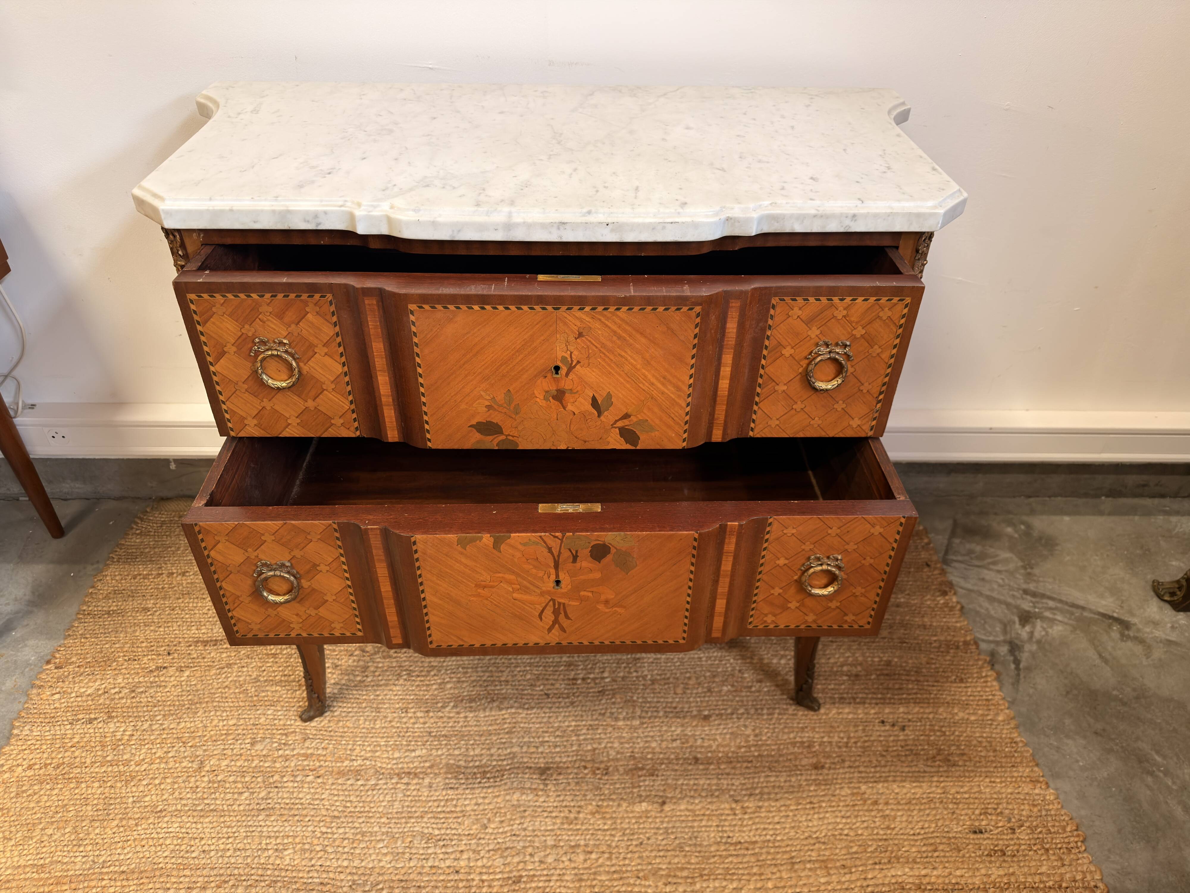 Commode Transition stamped by François Daidé, with a white marble top.