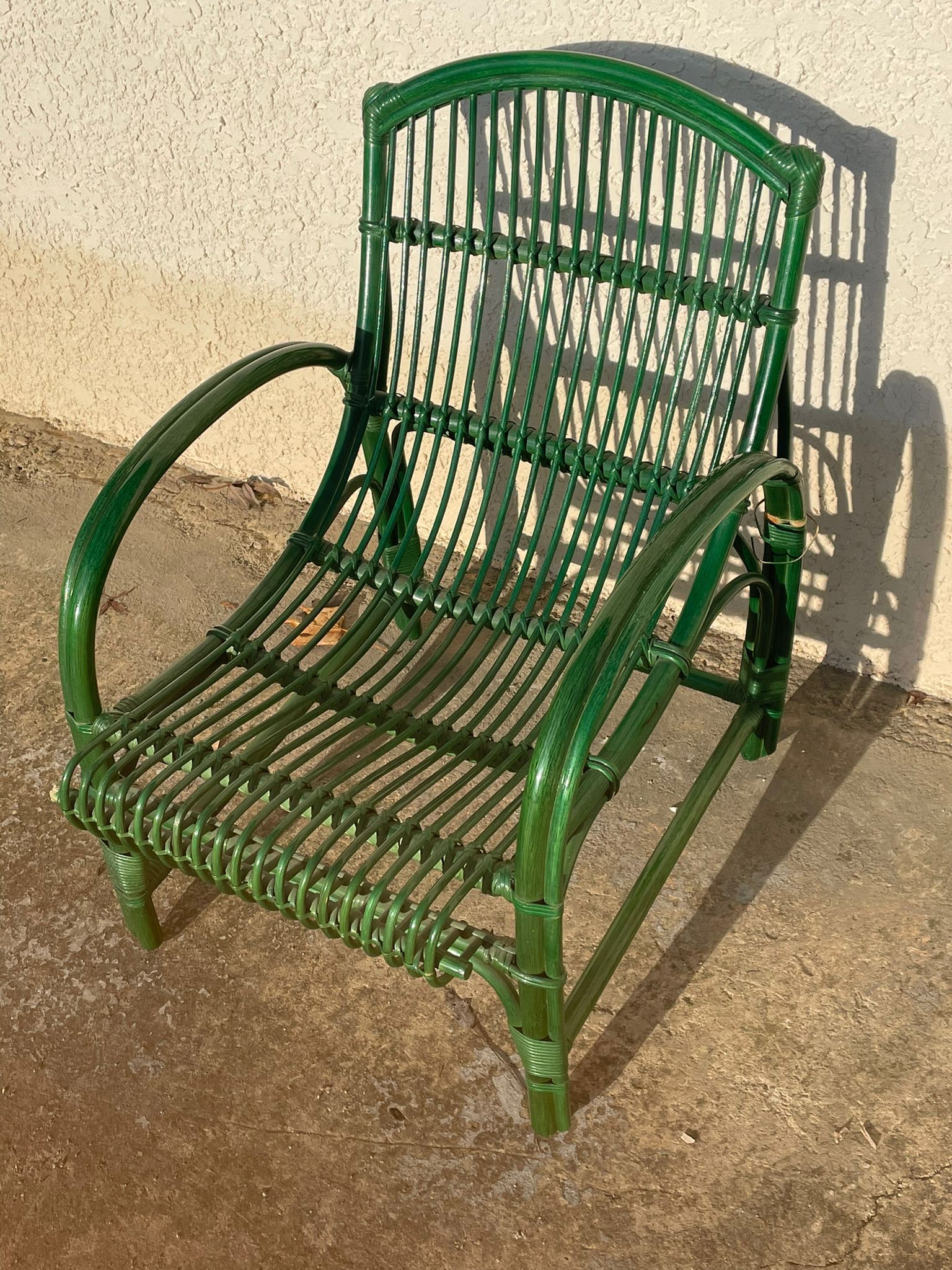 Green rattan armchair