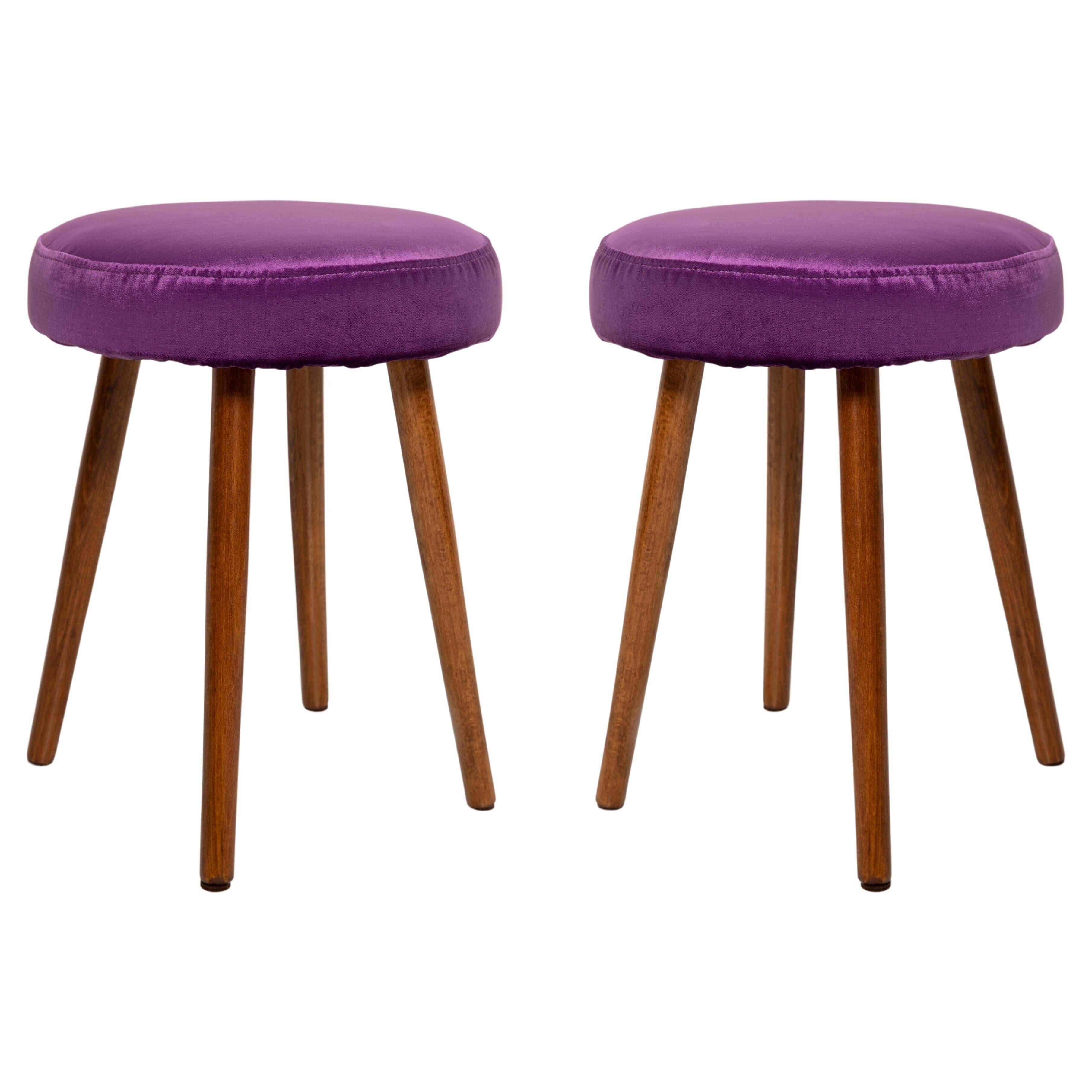 Set of two shiny purple velvet stools from the mid-century, Europe, 1960s.