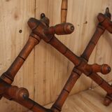 Turned wood wall coat rack