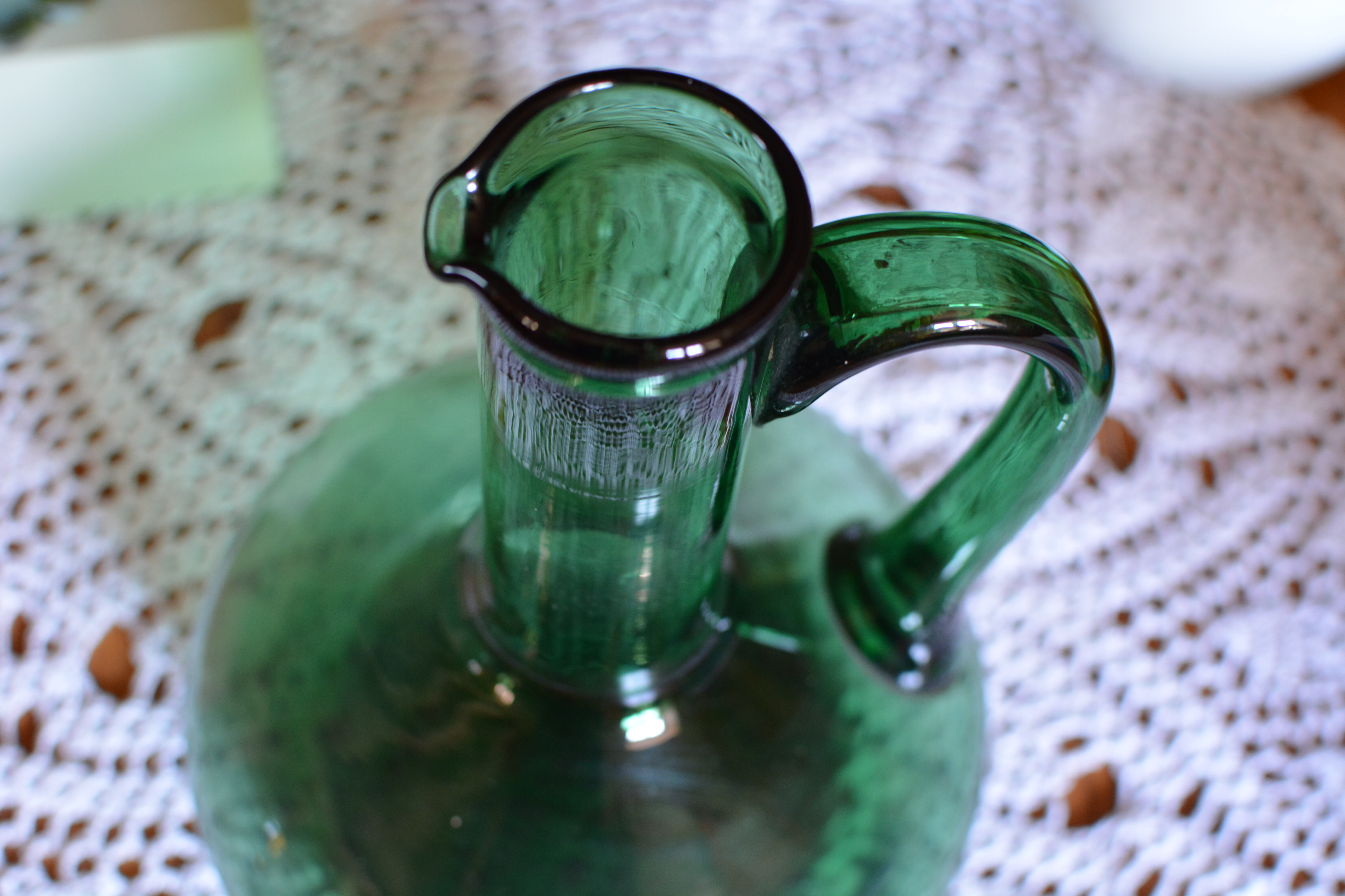 Blue green blown glass carafe