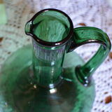 Blue green blown glass carafe