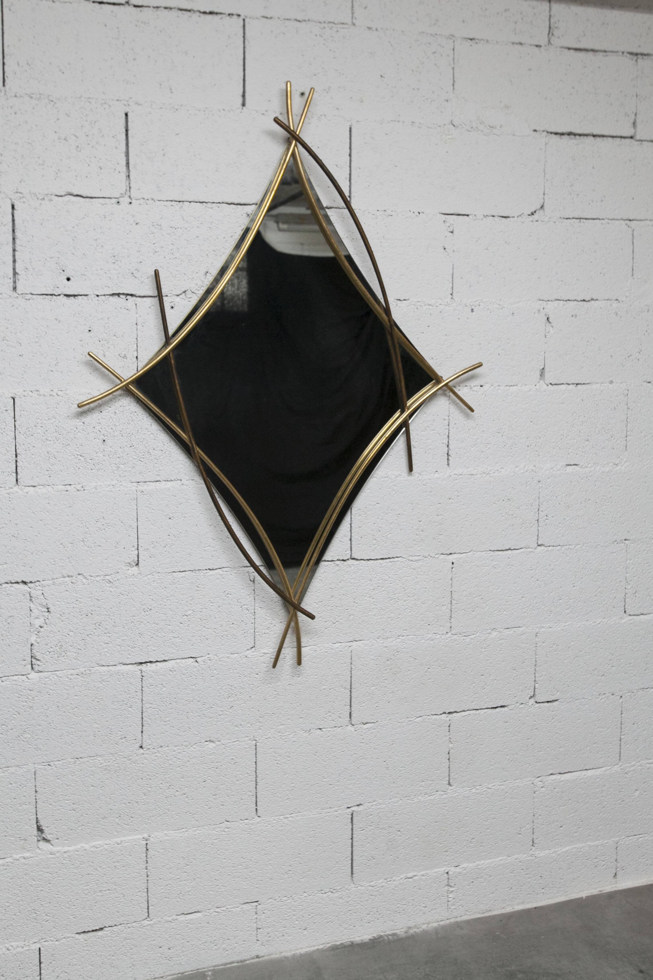 Sculptural mirror with two-tone gilded arches, France, 1970s, 95 x 133 cm