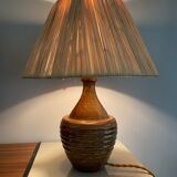 Sandstone lamp and raffia