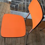 Lot of 4 vintage chairs in orange formica