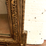 Miroir de style Napoléon III en bois et stuc patiné XX siécle