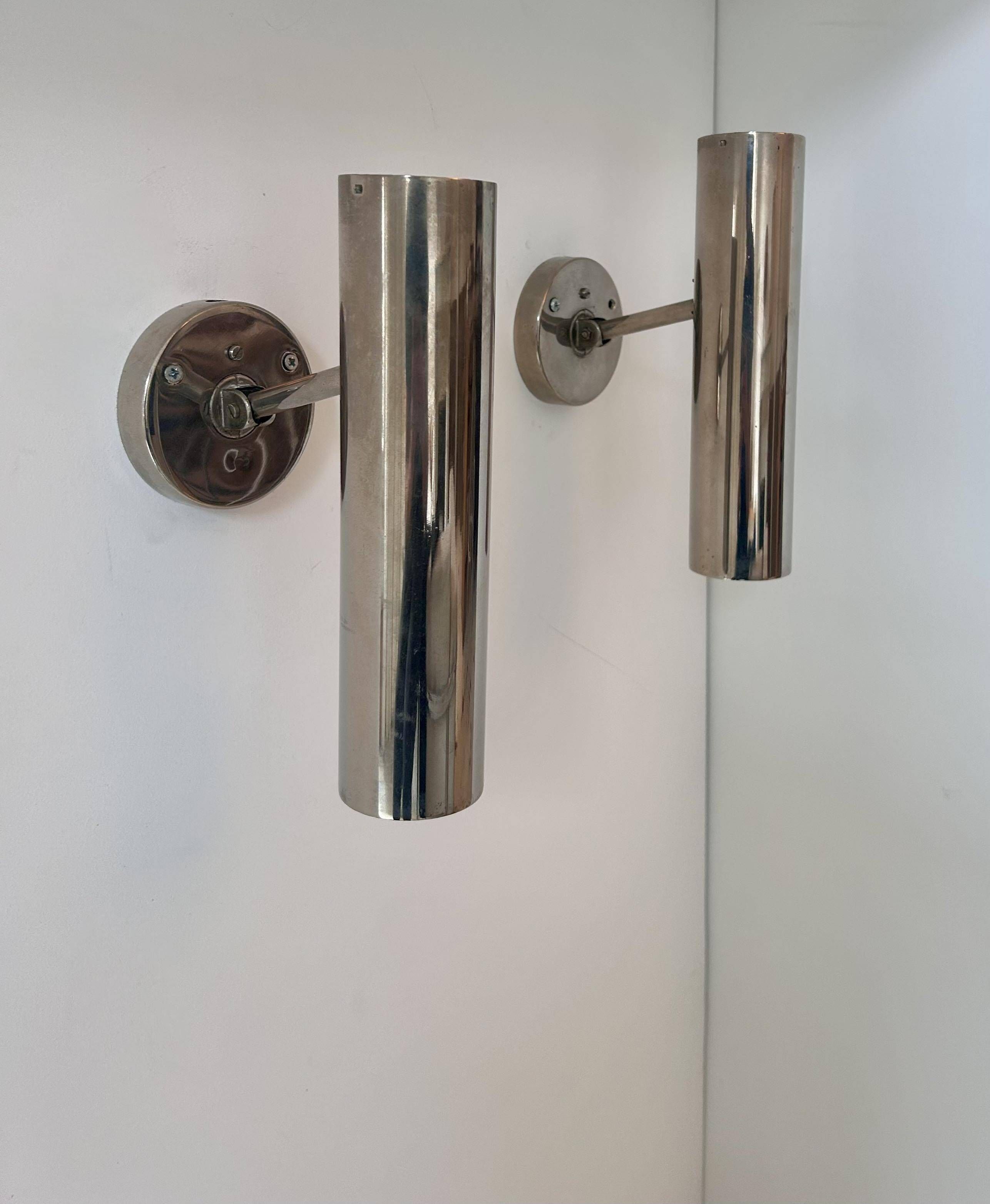 Pair of modernist adjustable wall lights, chrome metal, France 1960