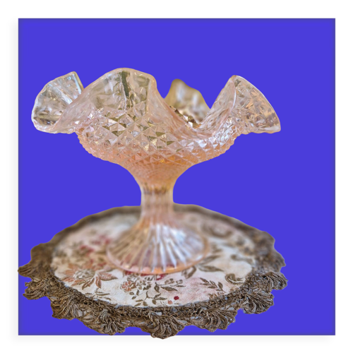 Small antique cup on foot in chiseled pink glass