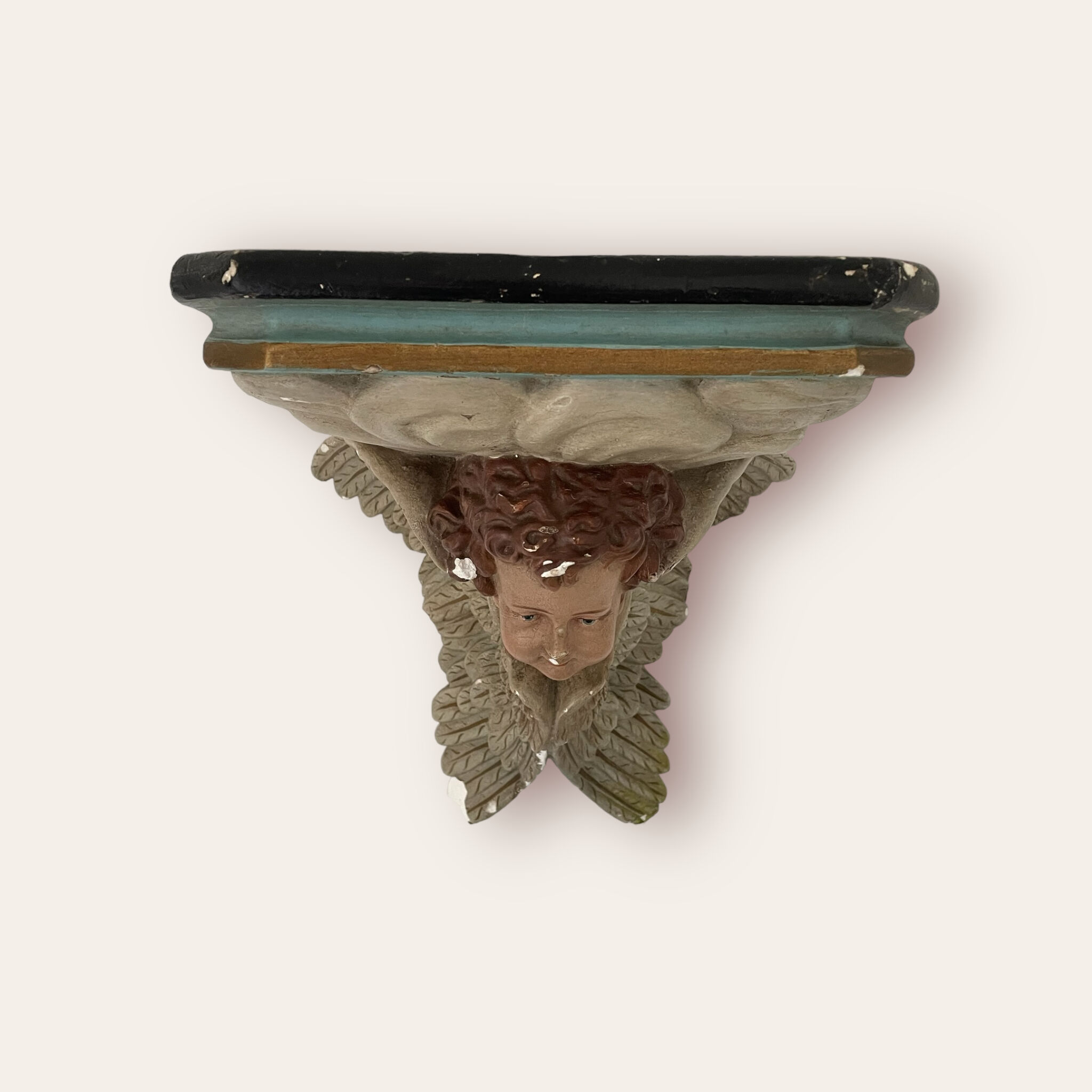 Nineteenth century plaster wall console, cherub decoration