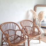 Pair of vintage rattan armchairs circa the 1970s.