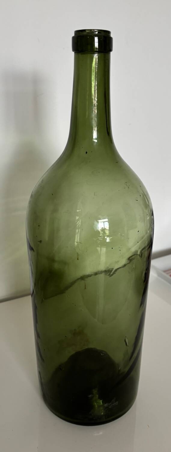 Pair of large antique blown glass bottles