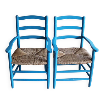 Pair of Provençal armchairs in painted wood and straw, around 1960.