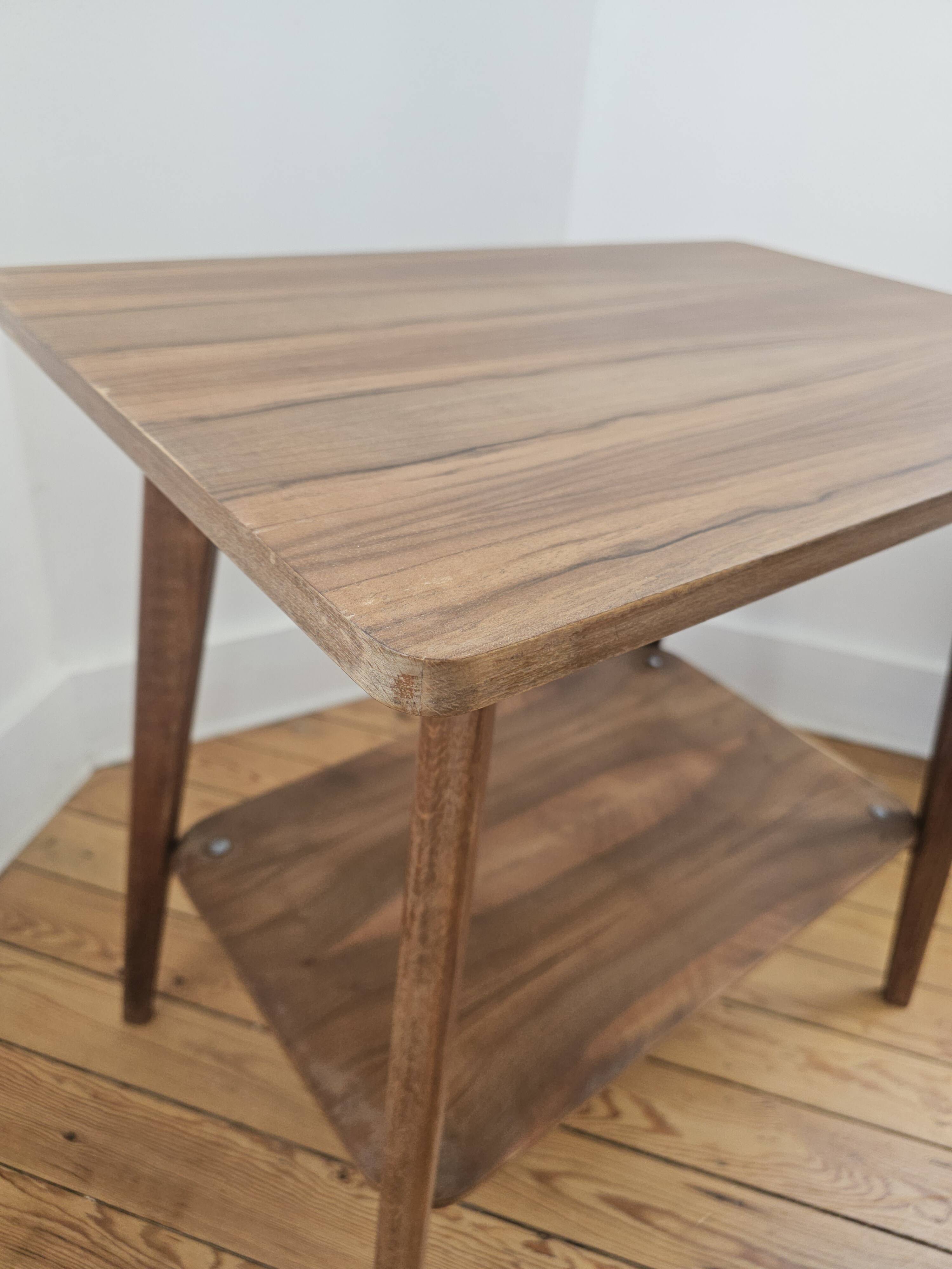 Vintage side table with double top in Scandinavian style.