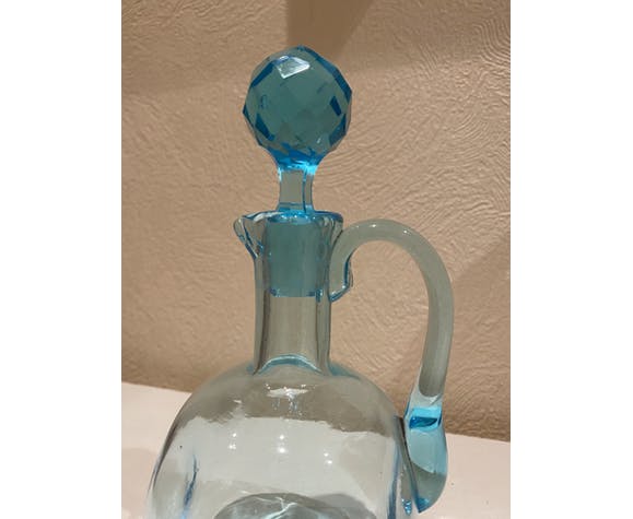 Blue carafe with vintage button