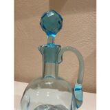 Blue carafe with vintage button