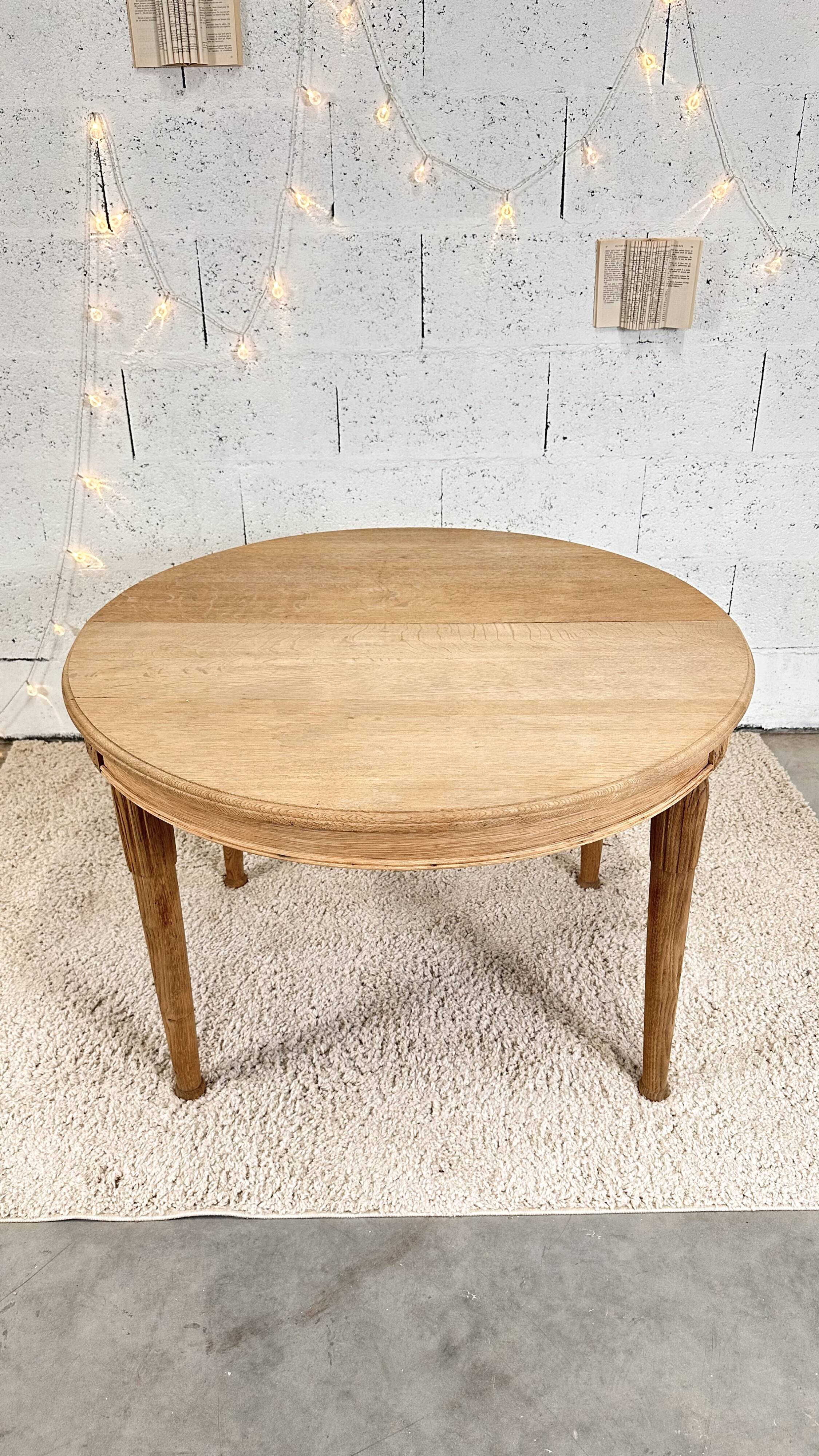 Old oval raw wood table