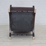 1970s, vintage armchair with footstool, black furniture leather.