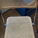 Plia chairs by Castelli in wood and cane.