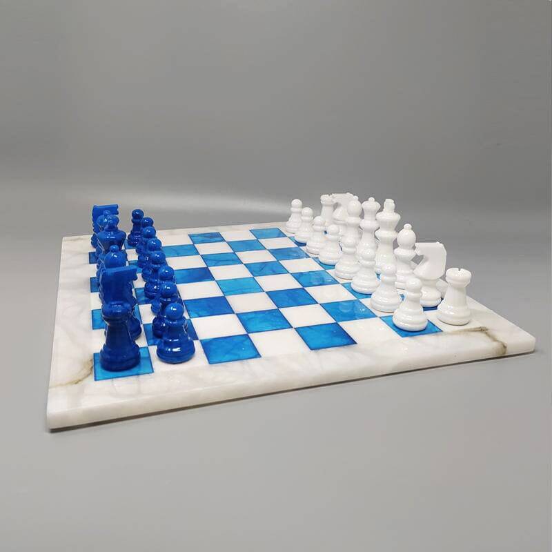1970s gorgeous sky blue and white chess set in Volterra alabaster handmade. Made in Italy