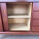 Scandinavian teak sideboard, 230 cm long, with 3 doors and 4 drawers.