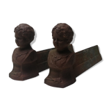 Pair of cast iron fireplace chenets "children"