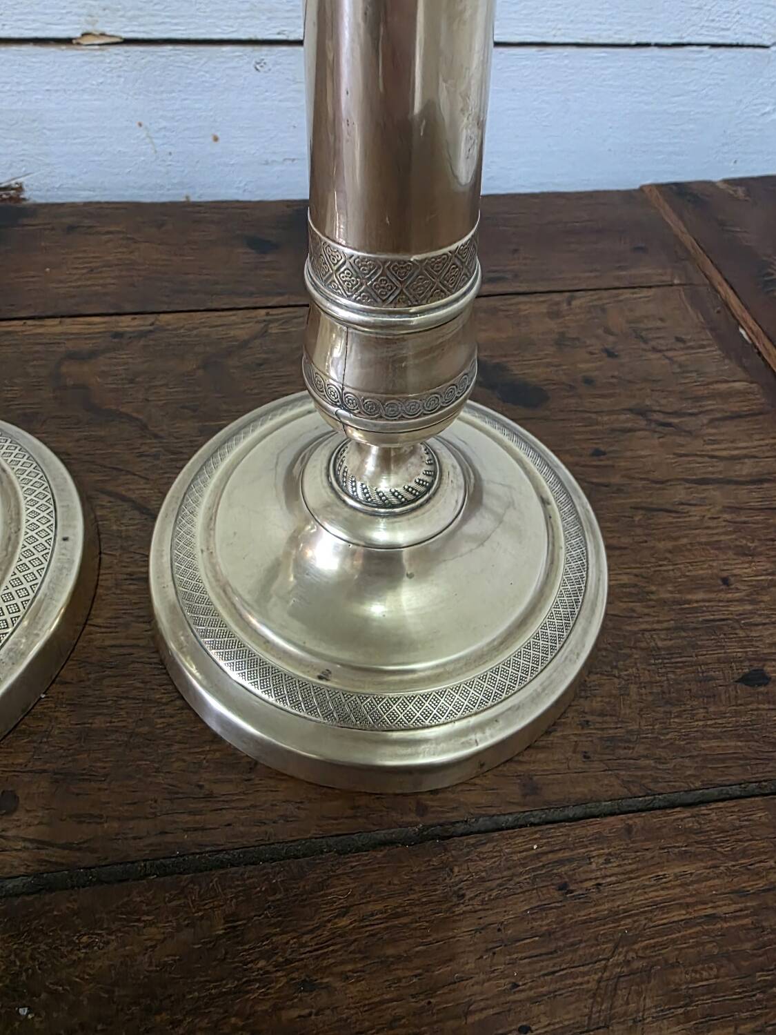Antique pair of brass candlesticks