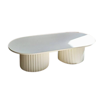 oblong coffee table on 2 fluted bases in light beige