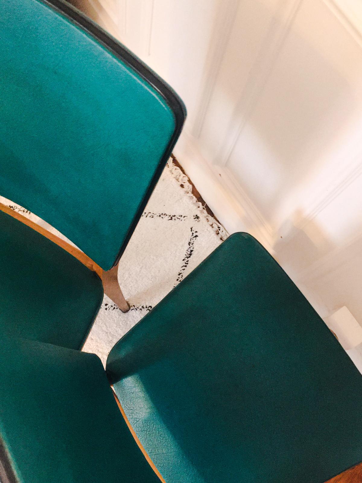 Two 1950s chairs made of wood and skai