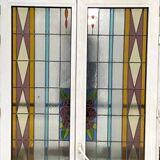 Pair of two-leaf windows in 20th century Art Deco stained glass