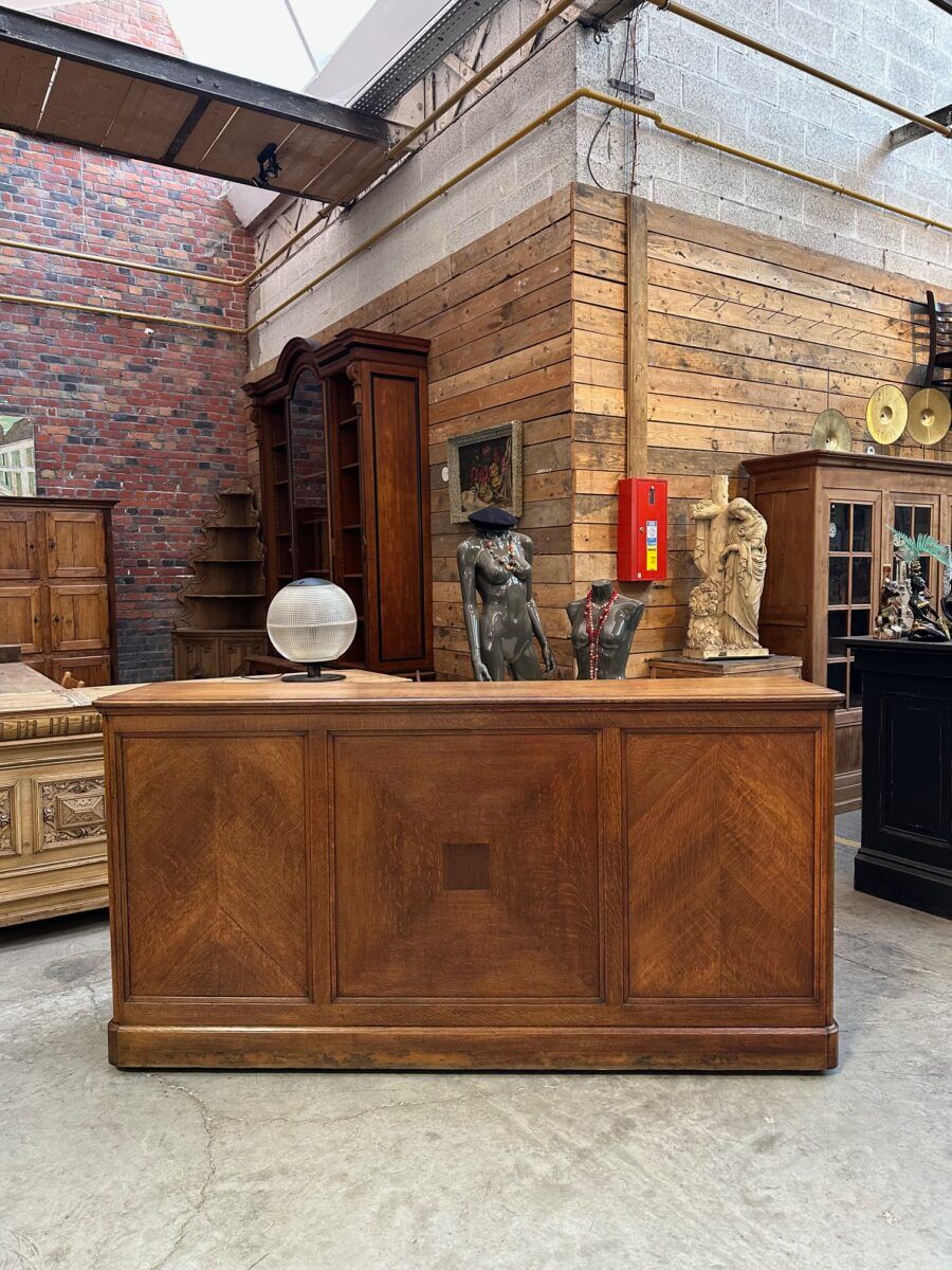 Early 20th-century oak hardware counter