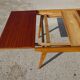 Extendable table, compass legs