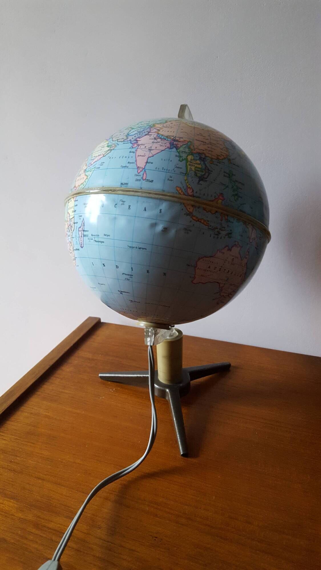 Bright vintage Earth globe brand Vulliermes with metal tripod foot