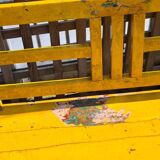 Old yellow teak school bench