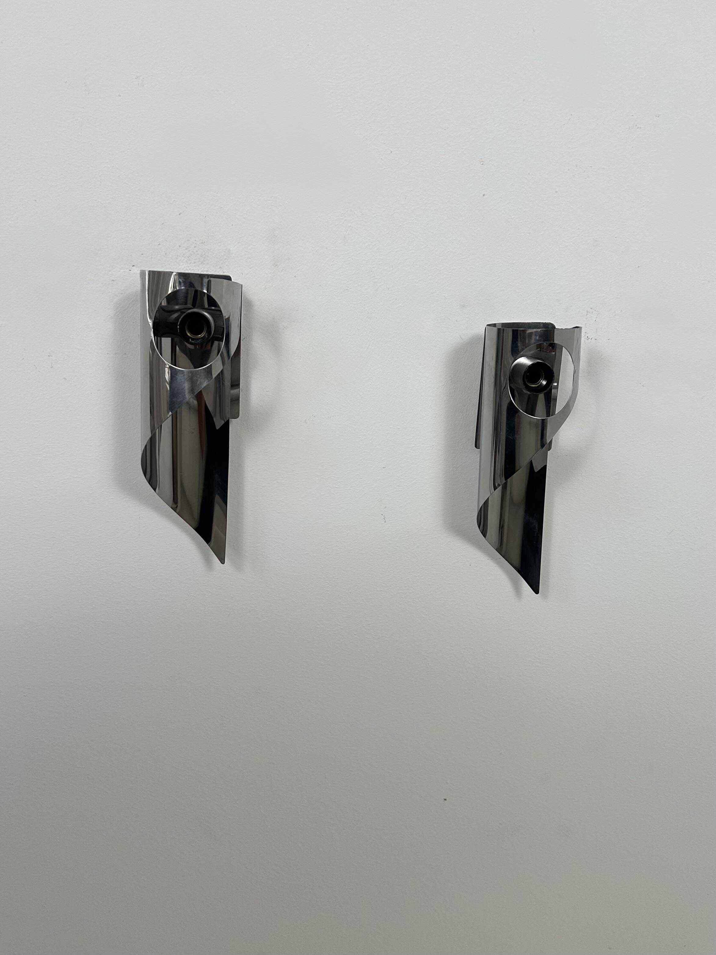Pair of vintage wall lights, chrome metal, France, 1970.